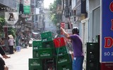 [Ảnh] Đa dạng cách chống nắng của người Hà Nội trong ngày đầu nóng cao điểm
