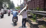 [Ảnh] Người dân Hà Nội chật vật di chuyển, mưu sinh trong cái nắng 40 độ C