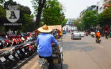 [Ảnh] Đa dạng cách chống nắng của người Hà Nội trong ngày đầu nóng cao điểm