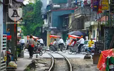 [Ảnh] Những khoảnh khắc bình dị nơi ‘xóm đường tàu’ khi bình minh lên