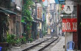 [Ảnh] Những khoảnh khắc bình dị nơi ‘xóm đường tàu’ khi bình minh lên
