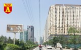 [ẢNH] Đường phố Hà Nội vắng hoe, người dân chống nắng kín mít vẫn ngại ra đường