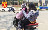 [ẢNH] Đường phố Hà Nội vắng hoe, người dân chống nắng kín mít vẫn ngại ra đường
