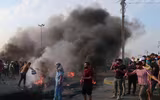 [ẢNH] Iraq tan hoang vì biểu tình biến thành bao động