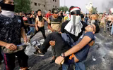 [ẢNH] Iraq tan hoang vì biểu tình biến thành bao động
