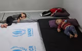 [ẢNH]: Đau lòng cuộc sống bấp bênh của các em nhỏ trong cuộc chiến ở đông bắc Syria