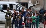 [ẢNH]: Đau lòng cuộc sống bấp bênh của các em nhỏ trong cuộc chiến ở đông bắc Syria