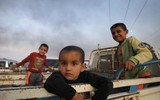 [ẢNH]: Đau lòng cuộc sống bấp bênh của các em nhỏ trong cuộc chiến ở đông bắc Syria
