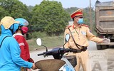[ẢNH] Cận cảnh chốt kiểm soát Covid-19 ở tuyến tỉnh lộ đặc biệt vào Thủ đô