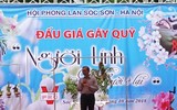 [ẢNH] Khoảnh khắc xúc động phiên đấu giá 32 giò lan của liệt sĩ phi công Khuất Mạnh Trí