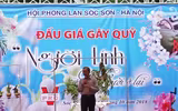 [ẢNH] Khoảnh khắc xúc động phiên đấu giá 32 giò lan của liệt sĩ phi công Khuất Mạnh Trí