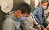 Hàng đoàn người đeo khẩu trang phòng dịch, cảnh chưa từng thấy tại sân bay Việt Nam