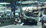 Ô tô tải 'hạ gục' thanh chắn cầu vượt Thái Hà- Tây Sơn