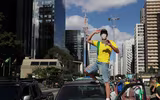 [Ảnh] Từ lễ hội carnival tới những ngôi mộ tập thể - Brazil thành 