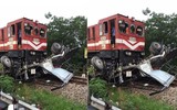 Hà Nội: Xe tải bị tàu hoả tông nát như đống sắt vụn