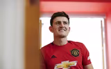 [ẢNH] Harry Maguire phấn khởi khoác lên mình màu áo M.U
