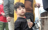 [ẢNH] Ngàn người chầu chực dưới mưa chờ mua vé trận Việt Nam - Malaysia