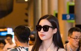 Trở về từ Miss World, Mỹ Linh đeo kính đen che mắt thâm quầng