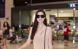 Trở về từ Miss World, Mỹ Linh đeo kính đen che mắt thâm quầng