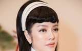 Lý Nhã Kỳ cùng Đàm Vĩnh Hưng đấu giá 2 bộ áo dài, thu về gần 1 tỷ đồng