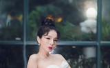 Lệ Quyên bất ngờ mặc váy cưới sau 7 năm kết hôn