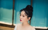 Lệ Quyên bất ngờ mặc váy cưới sau 7 năm kết hôn