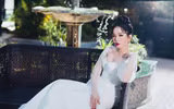 Lệ Quyên bất ngờ mặc váy cưới sau 7 năm kết hôn