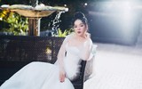 Lệ Quyên bất ngờ mặc váy cưới sau 7 năm kết hôn