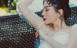Lệ Quyên bất ngờ mặc váy cưới sau 7 năm kết hôn