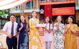 Vẻ đẹp giản dị của Hoa hậu Lương Thùy Linh khi về thăm trường cũ