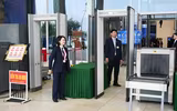 Hình ảnh lực lượng Cảnh vệ tham gia bảo vệ Lễ mở ký Công ước của Liên hợp quốc về phòng chống tội phạm mạng