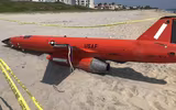 [ẢNH] UAV 700.000 USD của không quân Mỹ trôi dạt trên bãi biển