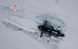[ẢNH] Tàu ngầm nguyên tử Nga khoét băng Bắc Cực để bắn tên lửa