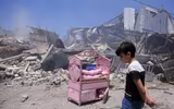 [ẢNH] Cách Israel đuổi thường dân ra ngoài trước khi đánh sập các tòa nhà tại dải Gaza