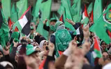 [ẢNH] Cách Israel đuổi thường dân ra ngoài trước khi đánh sập các tòa nhà tại dải Gaza