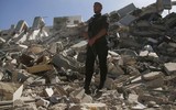[ẢNH] Cách Israel đuổi thường dân ra ngoài trước khi đánh sập các tòa nhà tại dải Gaza