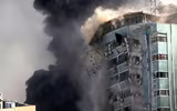 [ẢNH] Cách Israel đuổi thường dân ra ngoài trước khi đánh sập các tòa nhà tại dải Gaza