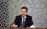 [ẢNH] Bashar al-Assad, người trụ vững giữa một chiến trường Syria đầy máu lửa