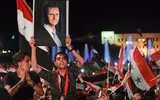 [ẢNH] Bashar al-Assad, người trụ vững giữa một chiến trường Syria đầy máu lửa