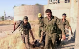 [ẢNH] Bashar al-Assad, người trụ vững giữa một chiến trường Syria đầy máu lửa
