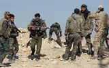 [ẢNH] Bashar al-Assad, người trụ vững giữa một chiến trường Syria đầy máu lửa