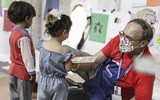 [ẢNH] Nhóm đàn ông Afghanistan tị nạn tấn công nữ binh sĩ Mỹ