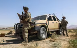 [ẢNH] Vụ lính Mỹ đổi thuốc lá lấy xe bán tải gắn súng máy Nga đề bảo vệ sân bay Kabul