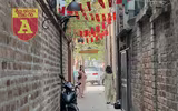 Độc lạ Hà Nội: Cả xóm bảo nhau xây nhà cổng vòm, tạo thành ngõ nhỏ ‘có 1-0-2’