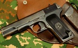[ẢNH] Súng ngắn TT-33 (K-54) huyền thoại tròn 90 năm phục vụ