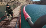 [ẢNH] Nước bắt đầu tràn qua đập trên kênh đào Bắc Crimea