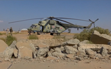 [ẢNH] Trực thăng Nga bị tấn công tại miền Bắc Syria?