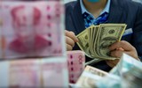 Đồng đô la Mỹ liên tiếp đón hai tin xấu liên quan đến Nga