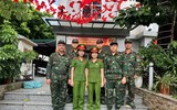 Hình ảnh người chiến sỹ Công an làm nhiệm vụ bảo vệ đêm hợp luyện sự kiện A80