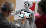 [ẢNH] Robot giúp con người trong cuộc chiến chống đại dịch Covid-19